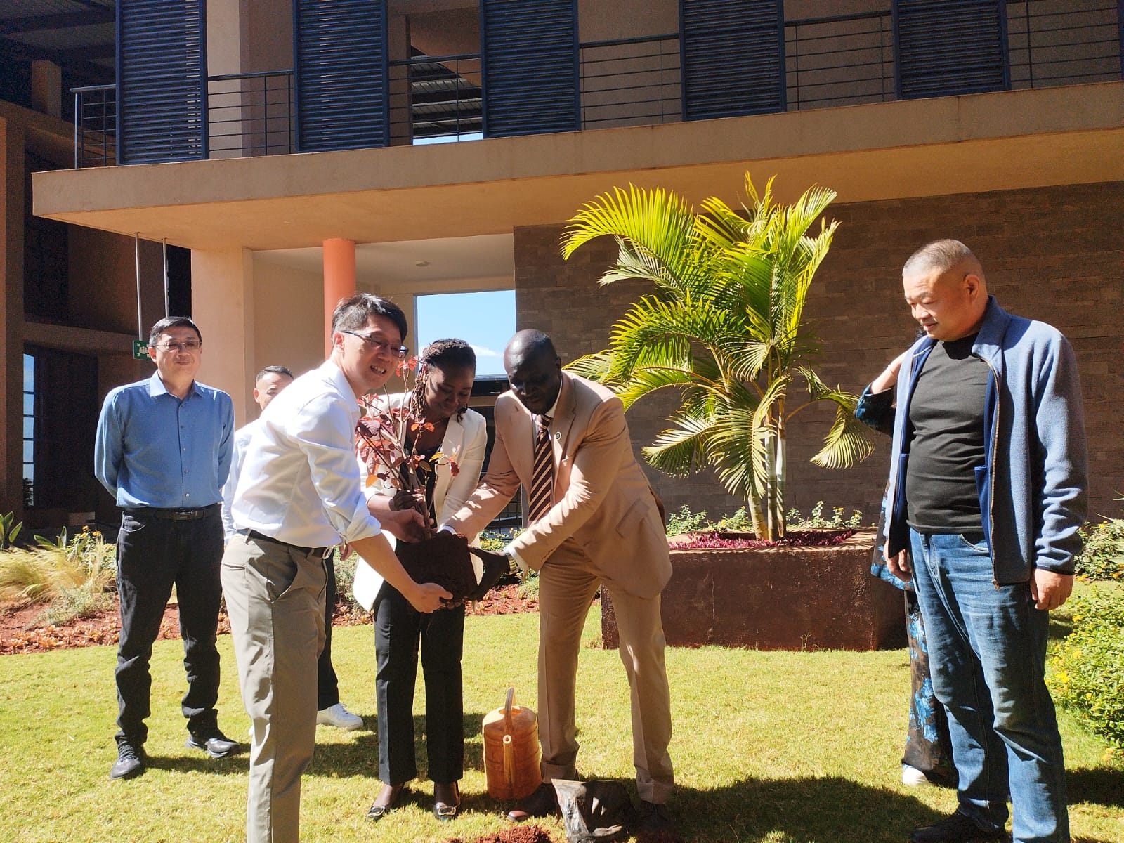 KCCCI Chairman-Mr. Tim Chen, CEO-Dr. Blak Aende and Mrs. Irene Atim planting the Chamber Tree